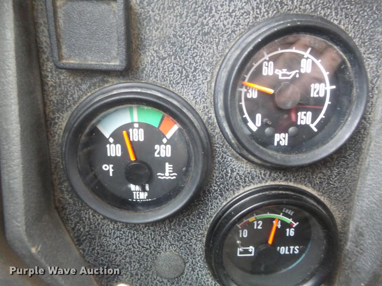 image for item DC7269 1999 Mack DM690S hooklift truck