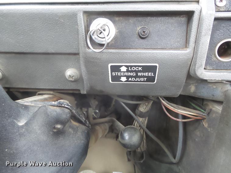 image for item DC7269 1999 Mack DM690S hooklift truck