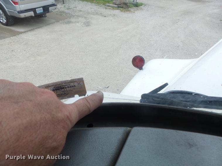 image for item DC7269 1999 Mack DM690S hooklift truck