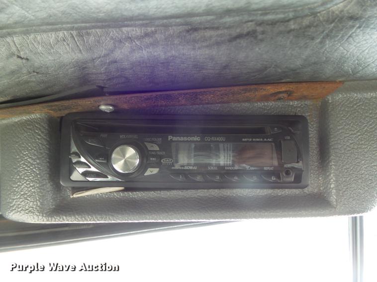 image for item DC7269 1999 Mack DM690S hooklift truck