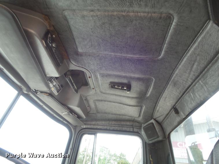 image for item DC7269 1999 Mack DM690S hooklift truck