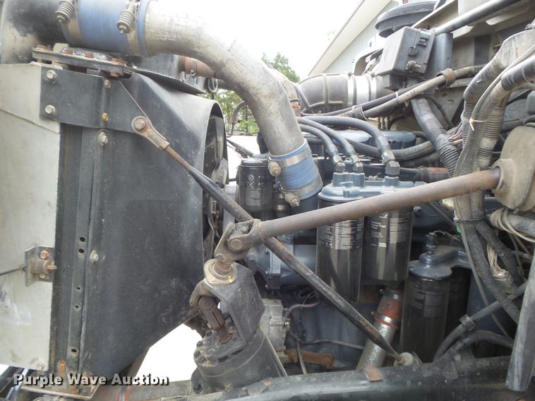 image for item DC7269 1999 Mack DM690S hooklift truck