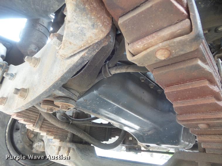 image for item DC7269 1999 Mack DM690S hooklift truck