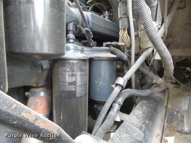 image for item DC7269 1999 Mack DM690S hooklift truck