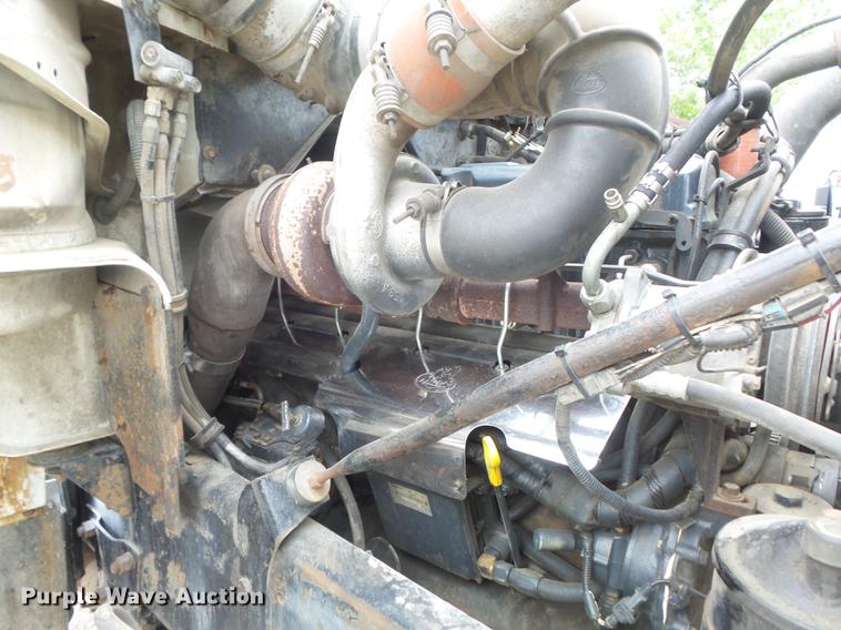 image for item DC7269 1999 Mack DM690S hooklift truck