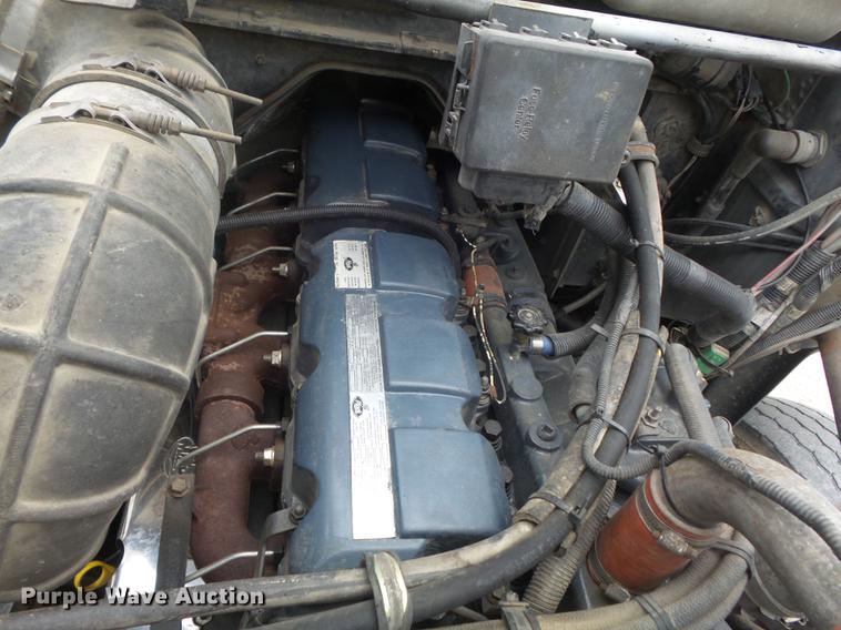 image for item DC7269 1999 Mack DM690S hooklift truck