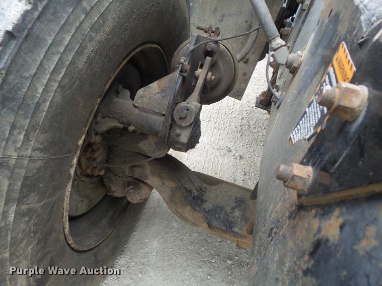 image for item DC7269 1999 Mack DM690S hooklift truck