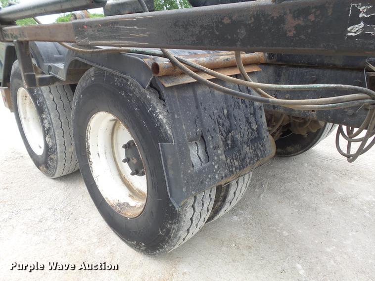 image for item DC7269 1999 Mack DM690S hooklift truck