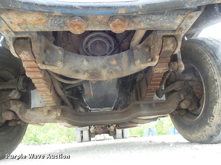 image for item DC7269 1999 Mack DM690S hooklift truck