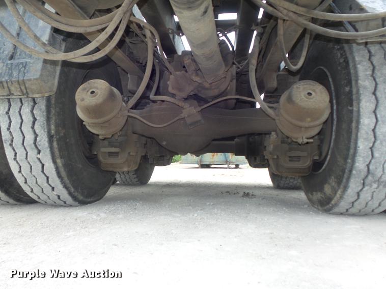 image for item DC7269 1999 Mack DM690S hooklift truck