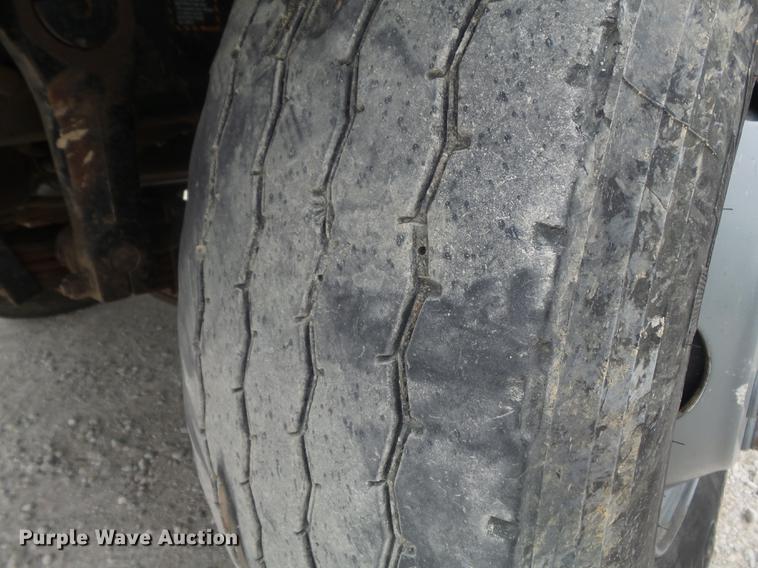 image for item DC7269 1999 Mack DM690S hooklift truck