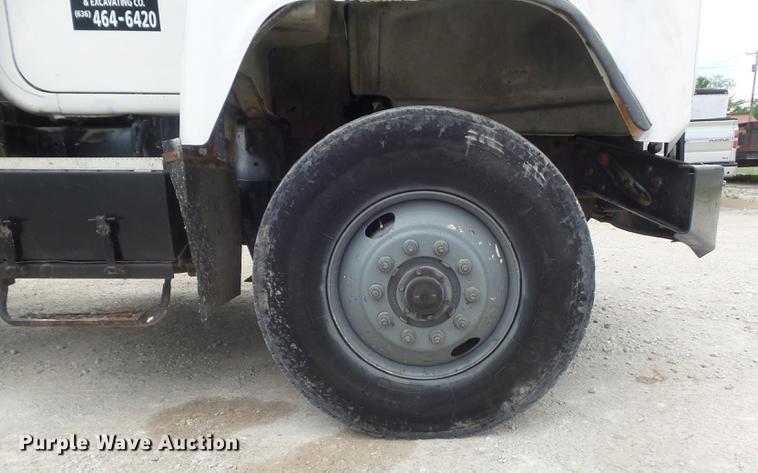 image for item DC7269 1999 Mack DM690S hooklift truck