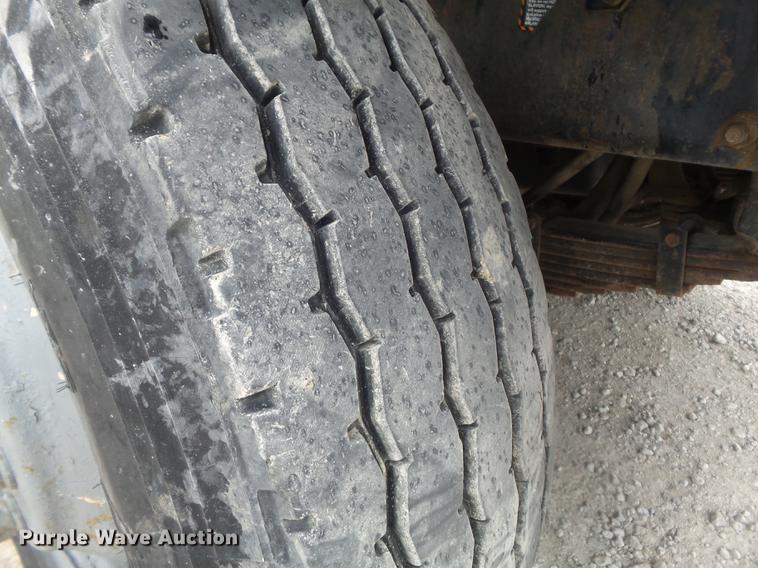 image for item DC7269 1999 Mack DM690S hooklift truck