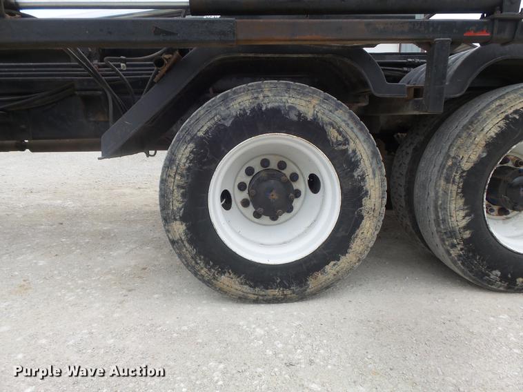 image for item DC7269 1999 Mack DM690S hooklift truck