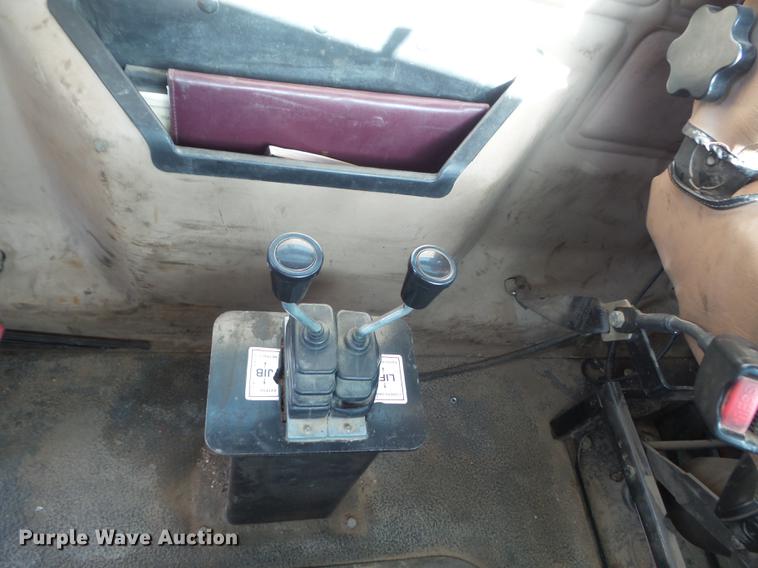 image for item DC7292 2007 Mack CV713 Granite hooklift truck