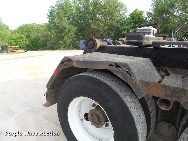 image for item DC7292 2007 Mack CV713 Granite hooklift truck