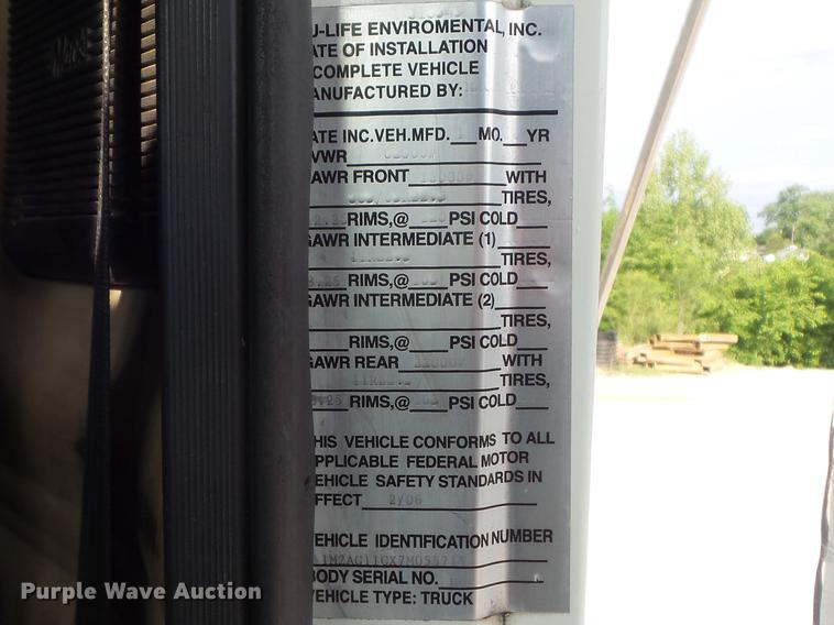 image for item DC7292 2007 Mack CV713 Granite hooklift truck