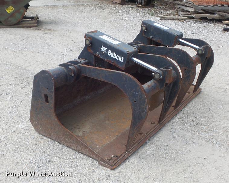 2011 Bobcat grapple bucket in Imperial, MO Item DM9963 sold Purple Wave