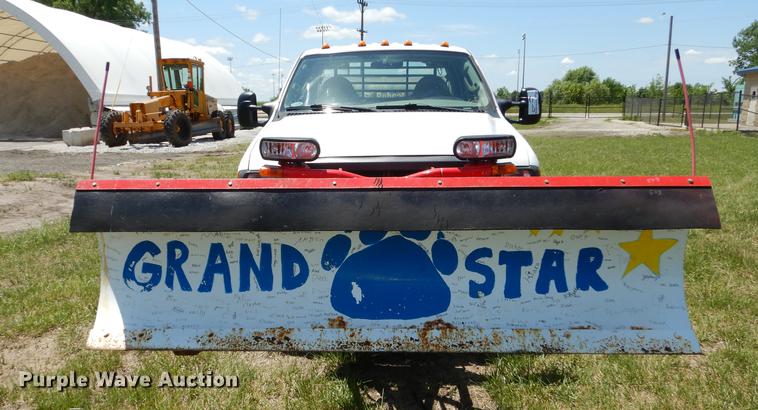 image for item DE1753 2005 Ford F350 Super Duty Crew Cab dump flatbed pickup truck