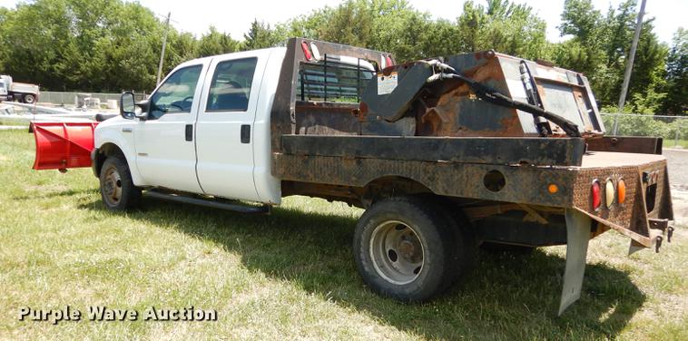 image for item DE1753 2005 Ford F350 Super Duty Crew Cab dump flatbed pickup truck