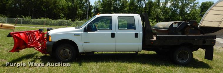 image for item DE1753 2005 Ford F350 Super Duty Crew Cab dump flatbed pickup truck