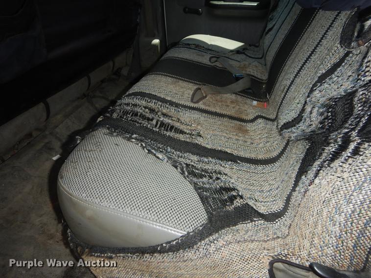 image for item DE1753 2005 Ford F350 Super Duty Crew Cab dump flatbed pickup truck