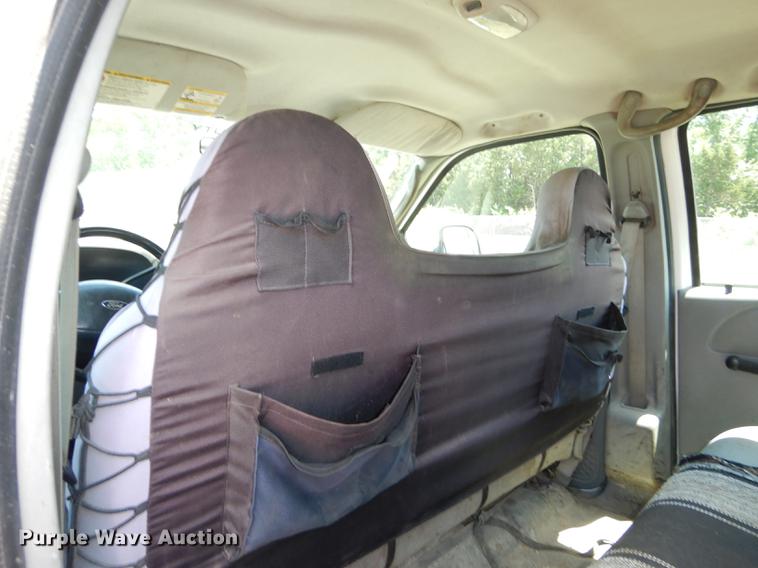 image for item DE1753 2005 Ford F350 Super Duty Crew Cab dump flatbed pickup truck