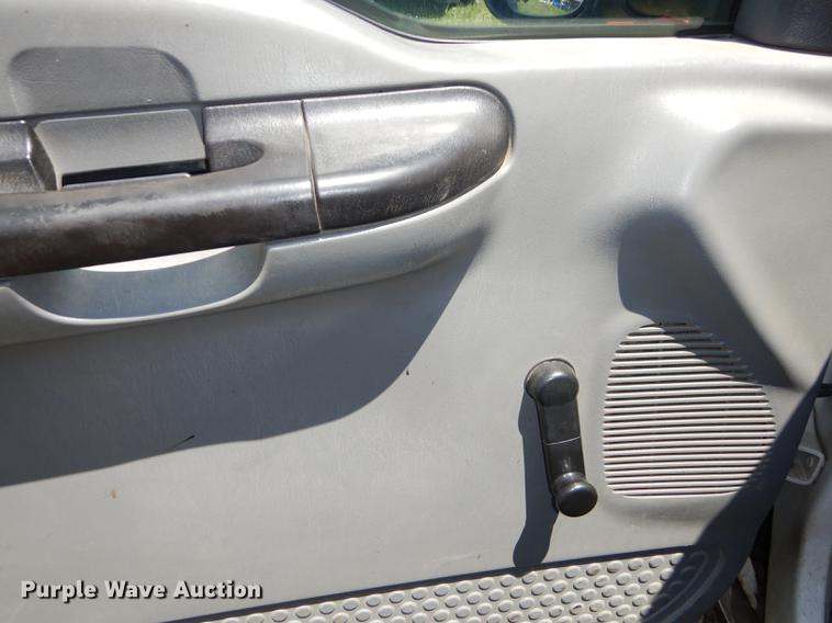 image for item DE1753 2005 Ford F350 Super Duty Crew Cab dump flatbed pickup truck