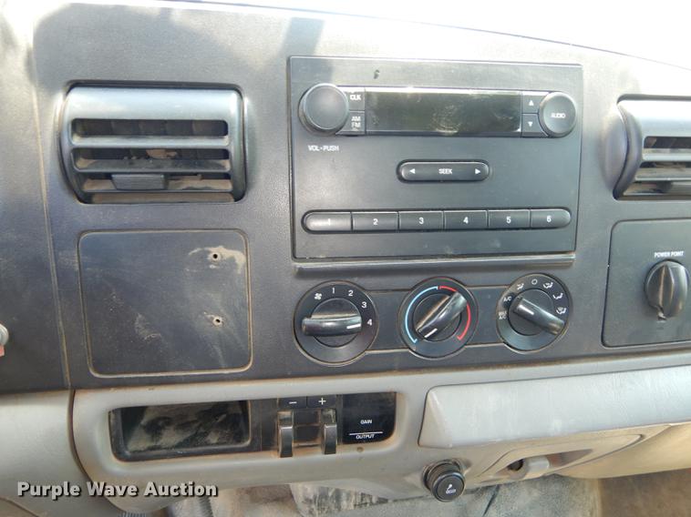 image for item DE1753 2005 Ford F350 Super Duty Crew Cab dump flatbed pickup truck