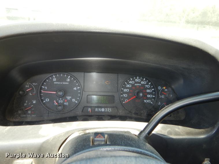 image for item DE1753 2005 Ford F350 Super Duty Crew Cab dump flatbed pickup truck