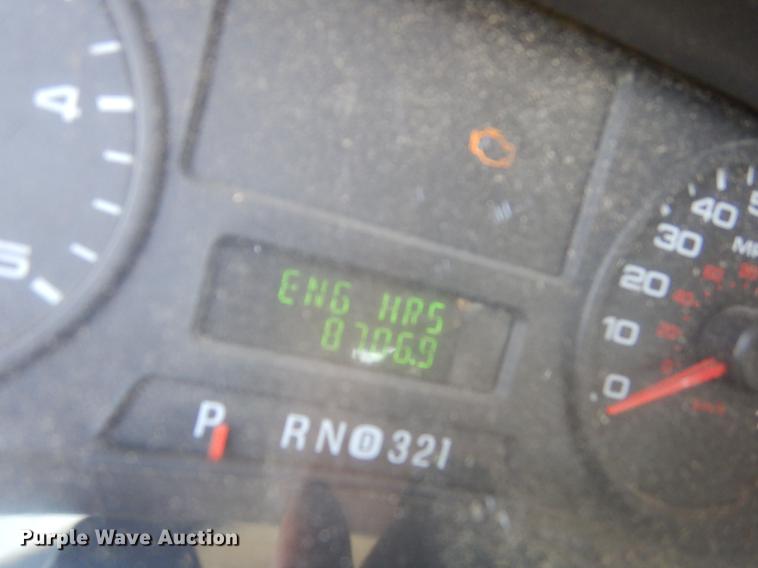 image for item DE1753 2005 Ford F350 Super Duty Crew Cab dump flatbed pickup truck