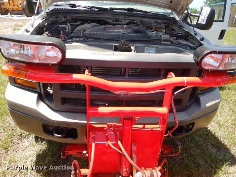 image for item DE1753 2005 Ford F350 Super Duty Crew Cab dump flatbed pickup truck