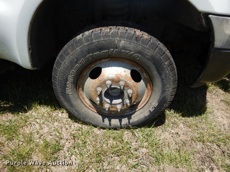 image for item DE1753 2005 Ford F350 Super Duty Crew Cab dump flatbed pickup truck