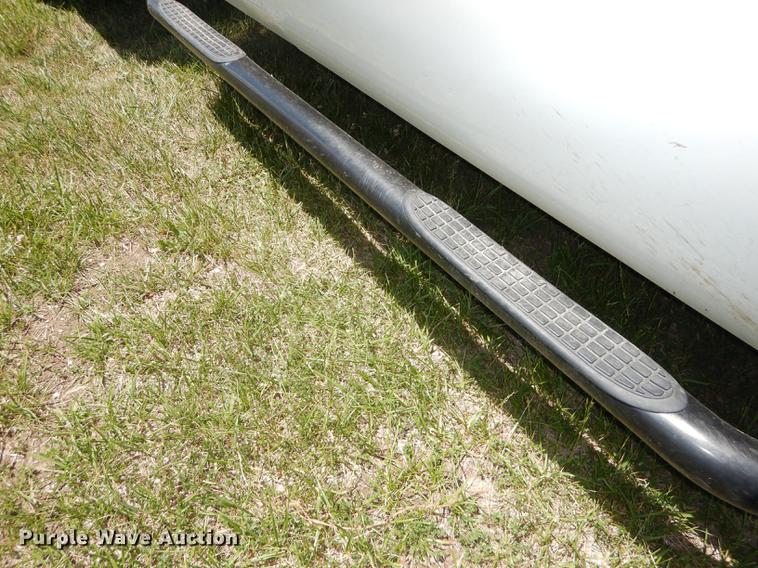 image for item DE1753 2005 Ford F350 Super Duty Crew Cab dump flatbed pickup truck