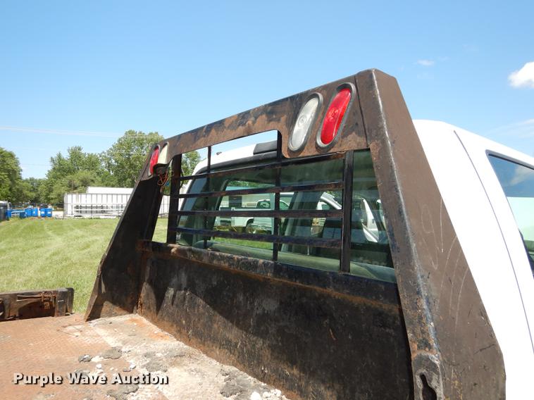 image for item DE1753 2005 Ford F350 Super Duty Crew Cab dump flatbed pickup truck