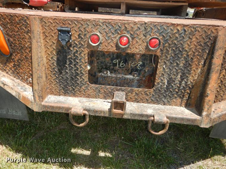 image for item DE1753 2005 Ford F350 Super Duty Crew Cab dump flatbed pickup truck