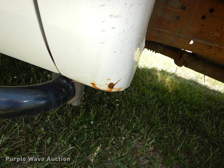 image for item DE1753 2005 Ford F350 Super Duty Crew Cab dump flatbed pickup truck