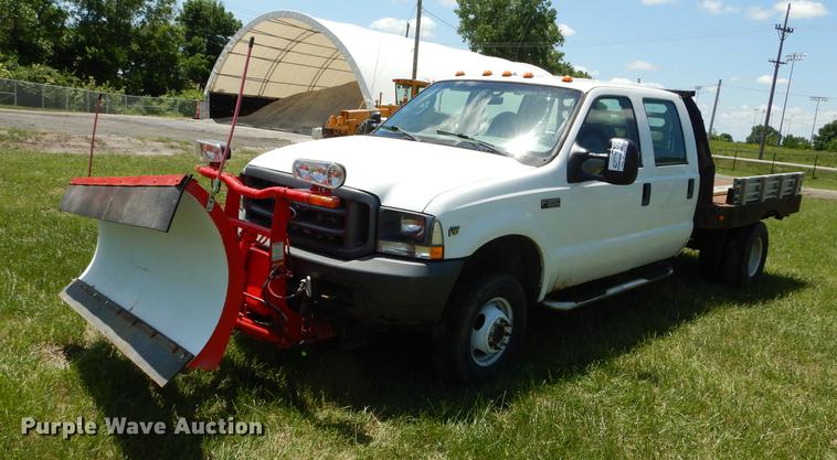 image for item DE1755 2004 Ford F350 Super Duty XL Crew Cab dump flatbed pickup truck