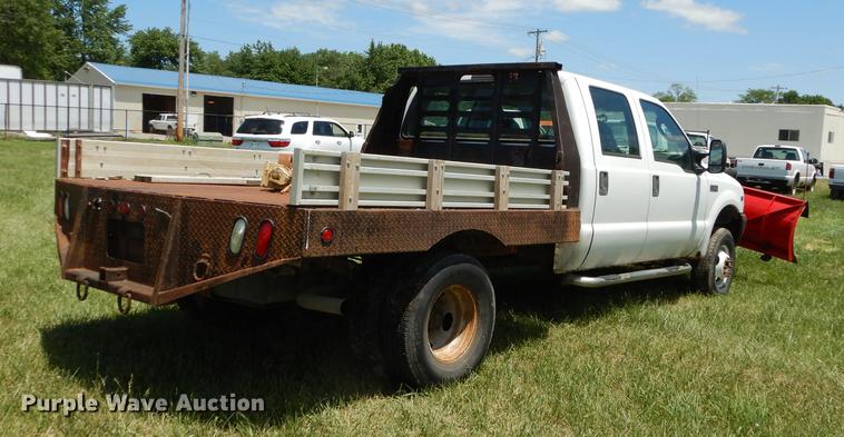 image for item DE1755 2004 Ford F350 Super Duty XL Crew Cab dump flatbed pickup truck