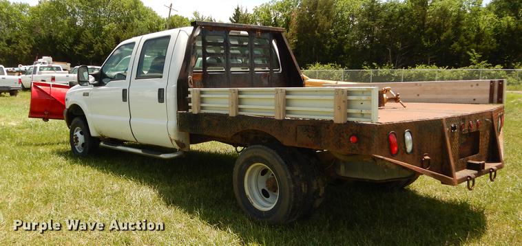 image for item DE1755 2004 Ford F350 Super Duty XL Crew Cab dump flatbed pickup truck