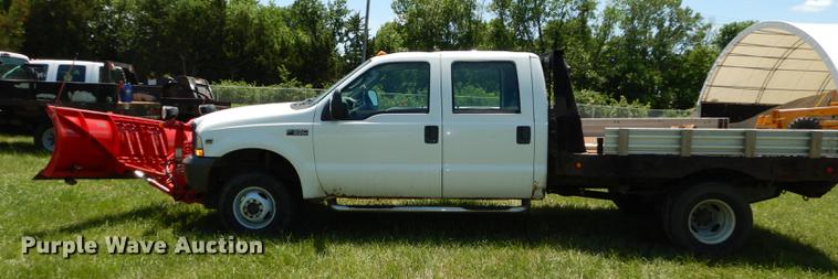 image for item DE1755 2004 Ford F350 Super Duty XL Crew Cab dump flatbed pickup truck