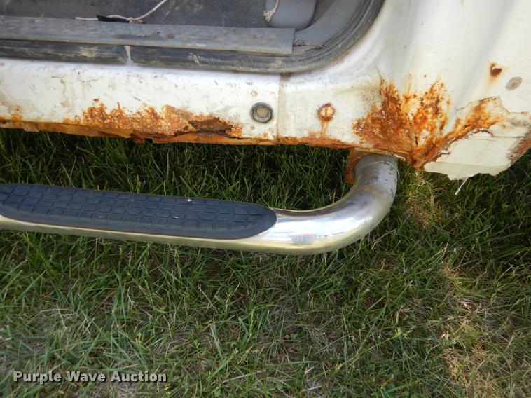 image for item DE1755 2004 Ford F350 Super Duty XL Crew Cab dump flatbed pickup truck