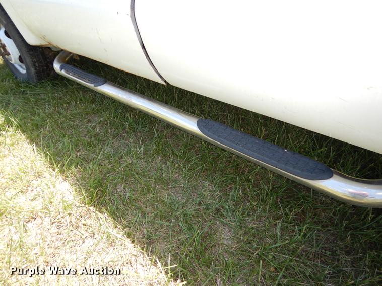 image for item DE1755 2004 Ford F350 Super Duty XL Crew Cab dump flatbed pickup truck