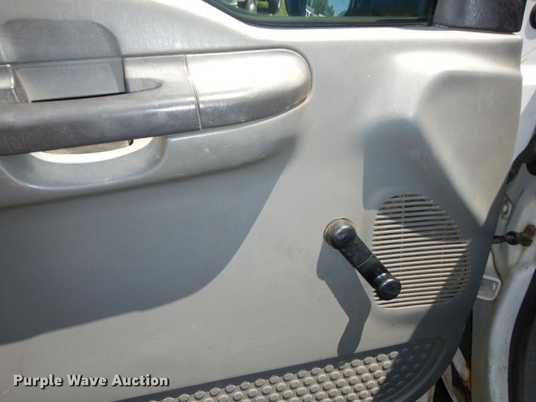 image for item DE1755 2004 Ford F350 Super Duty XL Crew Cab dump flatbed pickup truck