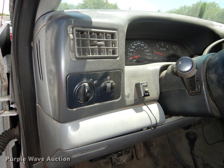 image for item DE1755 2004 Ford F350 Super Duty XL Crew Cab dump flatbed pickup truck