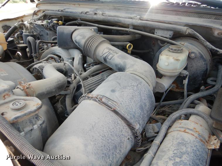 image for item DE1755 2004 Ford F350 Super Duty XL Crew Cab dump flatbed pickup truck