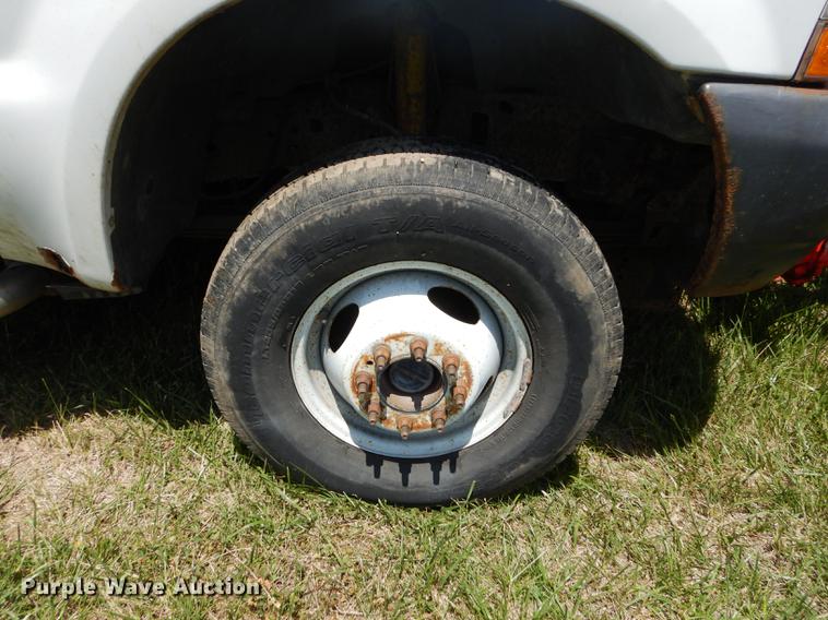 image for item DE1755 2004 Ford F350 Super Duty XL Crew Cab dump flatbed pickup truck