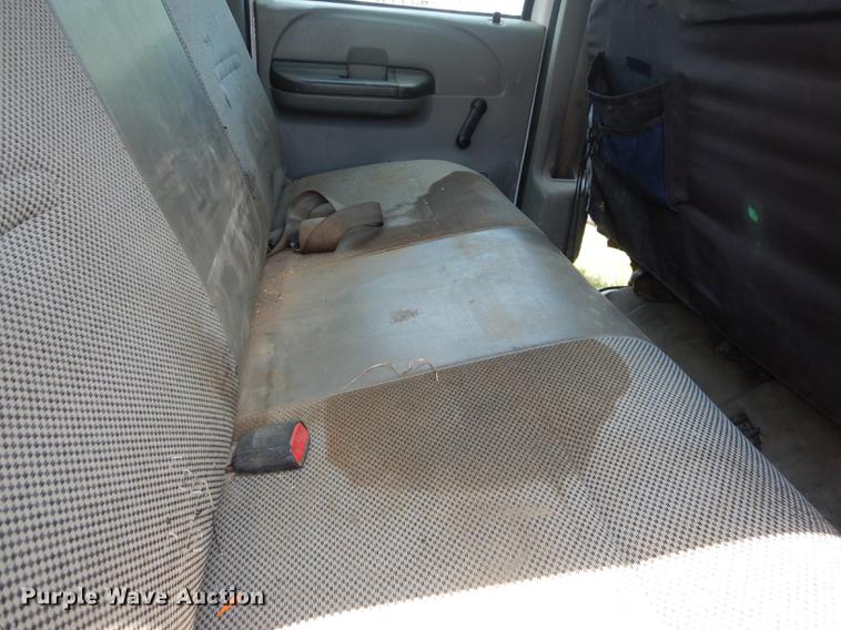 image for item DE1755 2004 Ford F350 Super Duty XL Crew Cab dump flatbed pickup truck