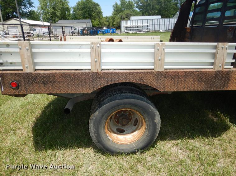 image for item DE1755 2004 Ford F350 Super Duty XL Crew Cab dump flatbed pickup truck