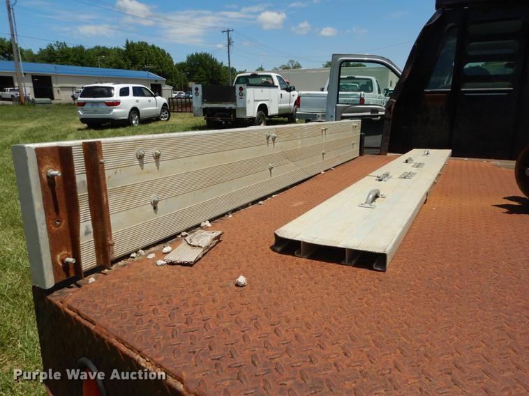 image for item DE1755 2004 Ford F350 Super Duty XL Crew Cab dump flatbed pickup truck